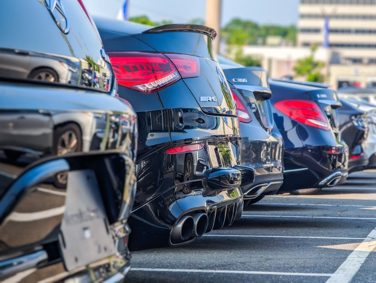Compact car at a Mediterranean airport ready for a summer holiday
