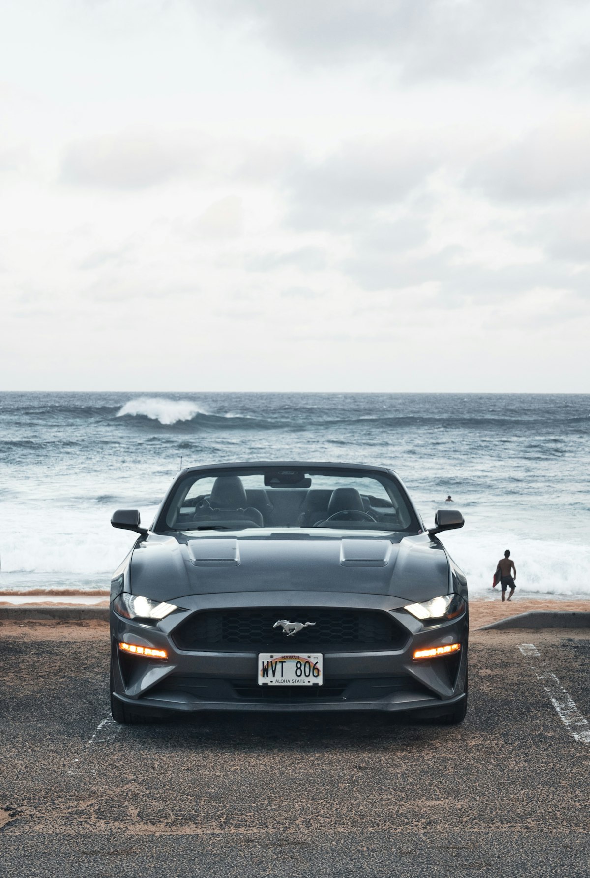 Compact convertibles on a sunny Mediterranean coastal road
