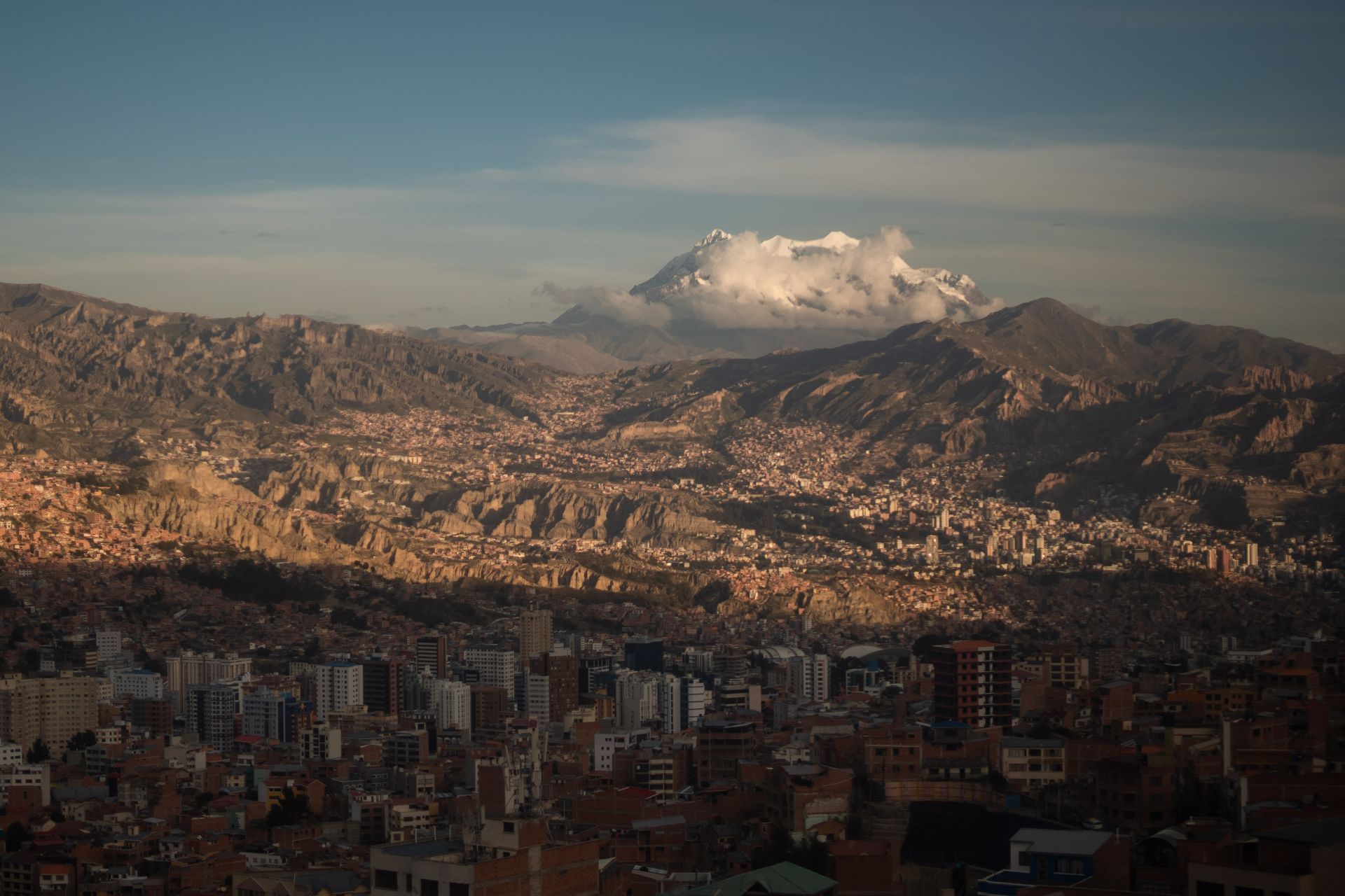 Rent a Car in La Paz: Rent a car in La Paz, Bolivia — aerial view of the city with Mount Illimani behind it